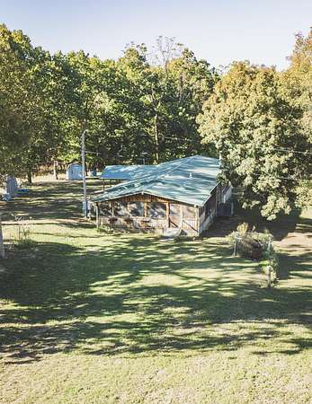 38.4 Acres of Land with Home for Sale in Powell, Missouri