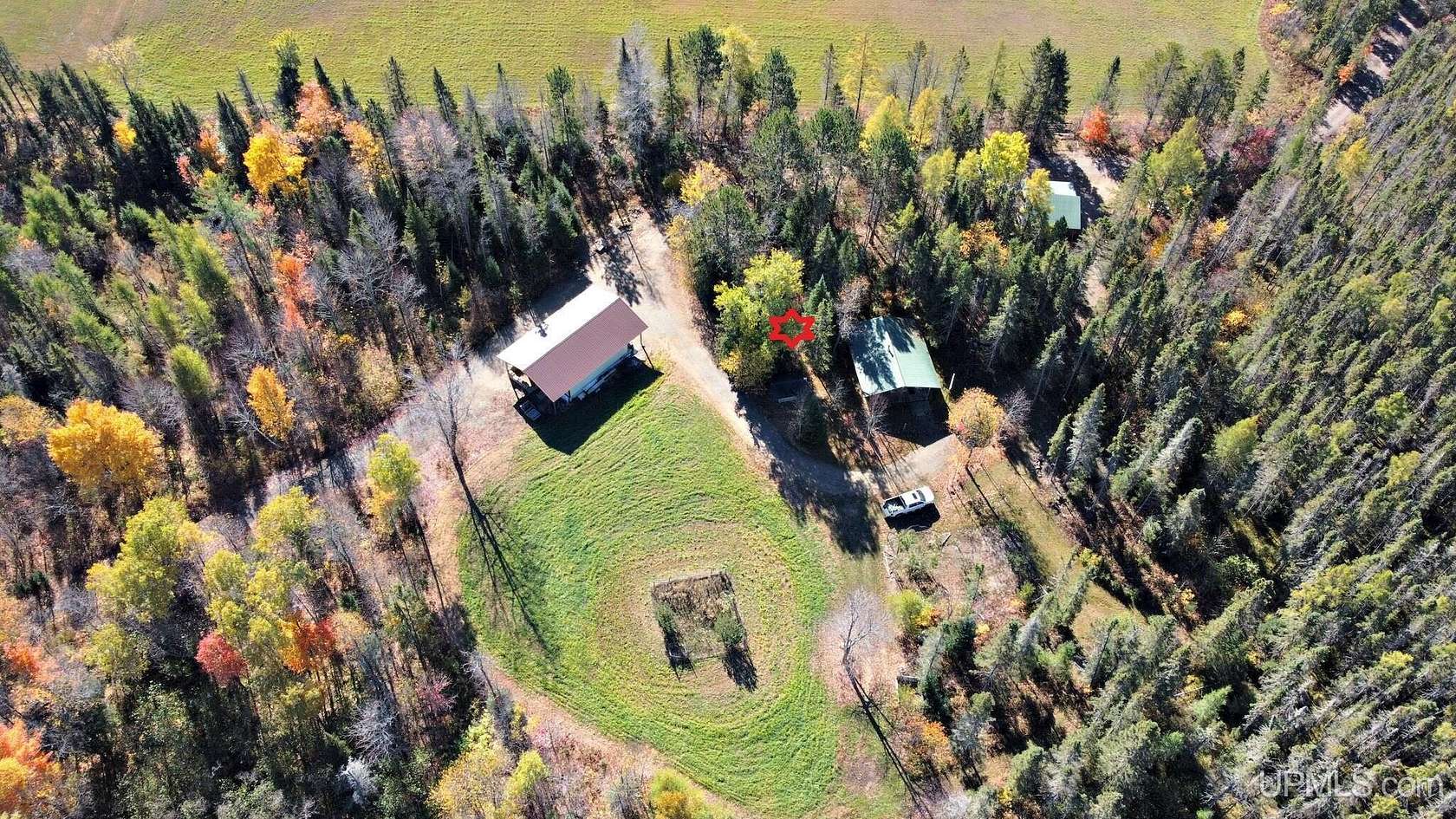 200 Acres of Recreational Land with Home for Sale in Republic, Michigan