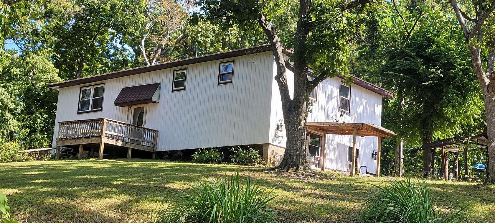 5 Acres of Land with Home for Sale in Hughesville, Missouri