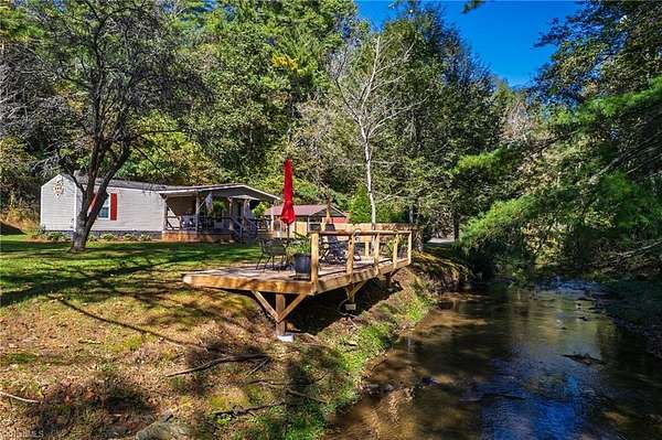 2.59 Acres of Land with Home for Sale in Glade Valley, North Carolina