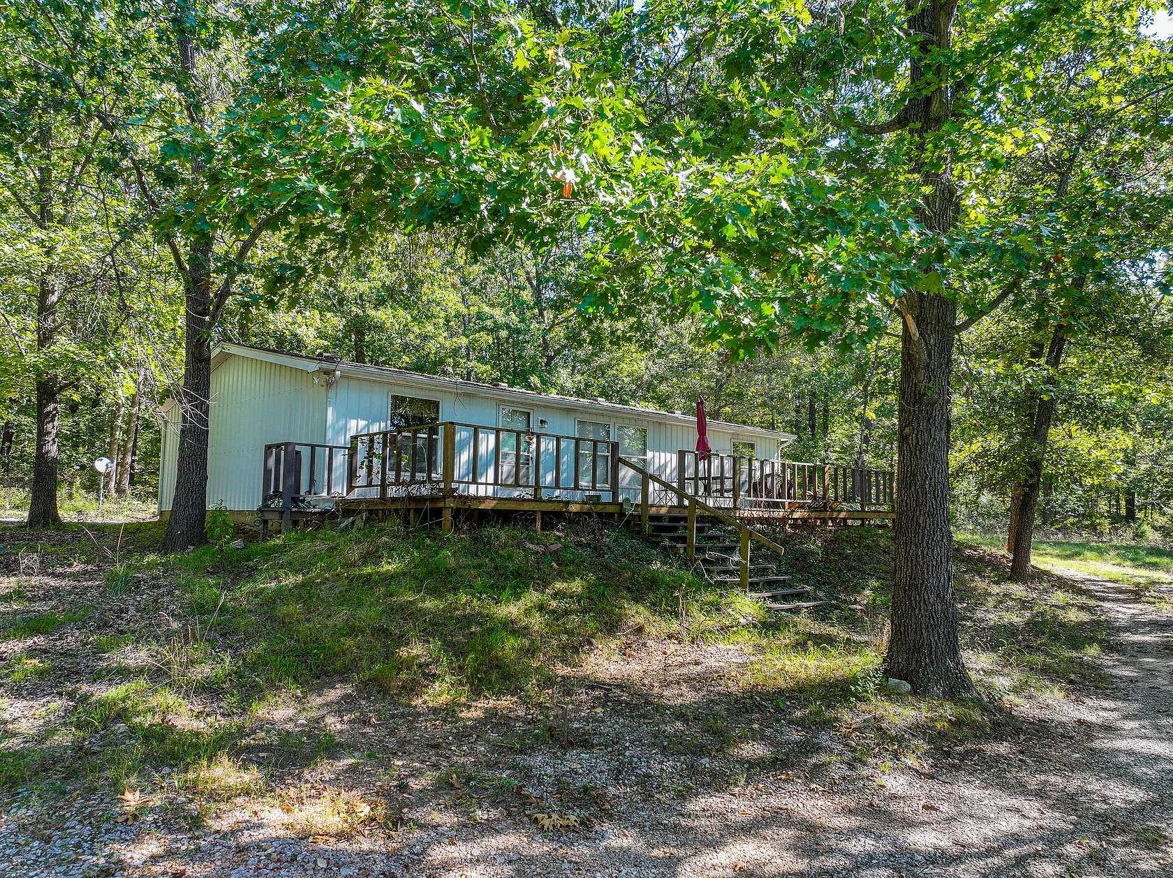 9.5 Acres of Land with Home for Sale in Osceola, Missouri