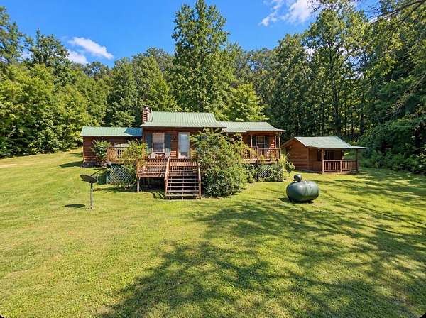 5.12 Acres of Land with Home for Sale in Tennessee Ridge, Tennessee