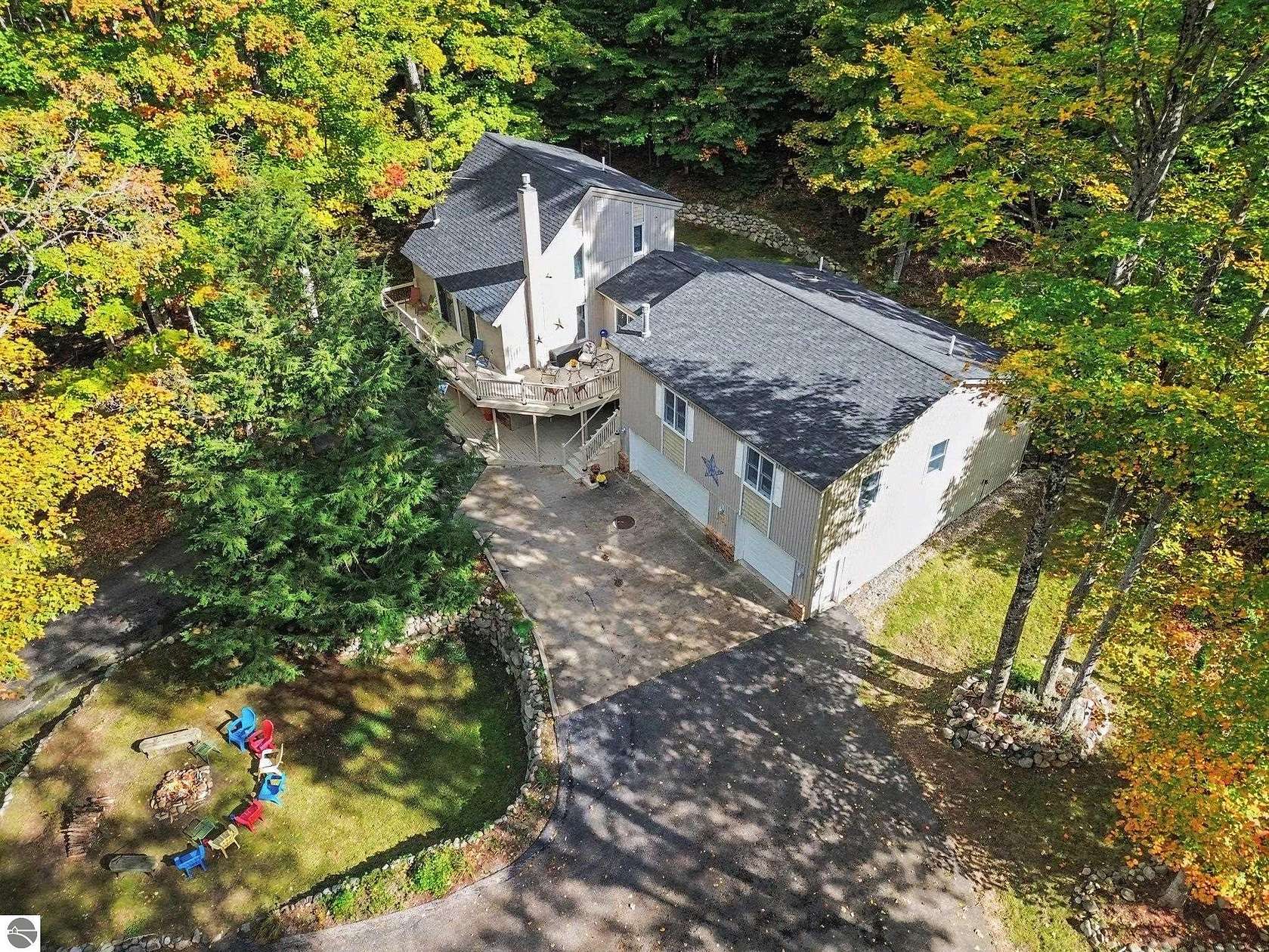 4.4 Acres of Land with Home for Sale in Bellaire, Michigan