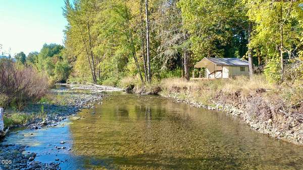 12.2 Acres of Land with Home for Sale in Cave Junction, Oregon