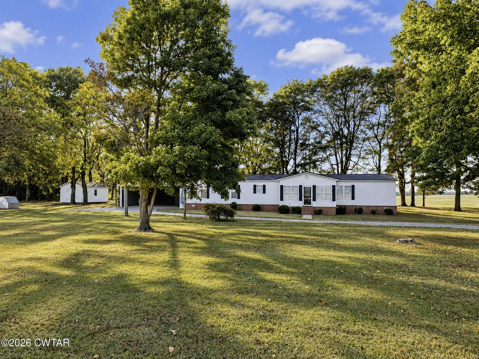 1.66 Acres of Land with Home for Sale in Newbern, Tennessee