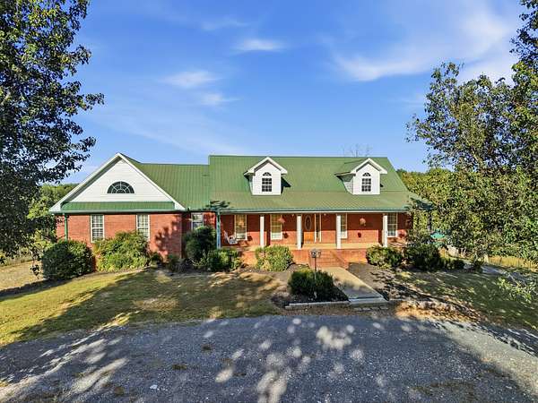 18.8 Acres of Land with Home for Auction in Whitleyville, Tennessee