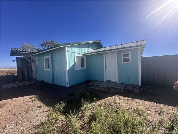 4.85 Acres of Improved Residential Land for Sale in Hooper, Colorado