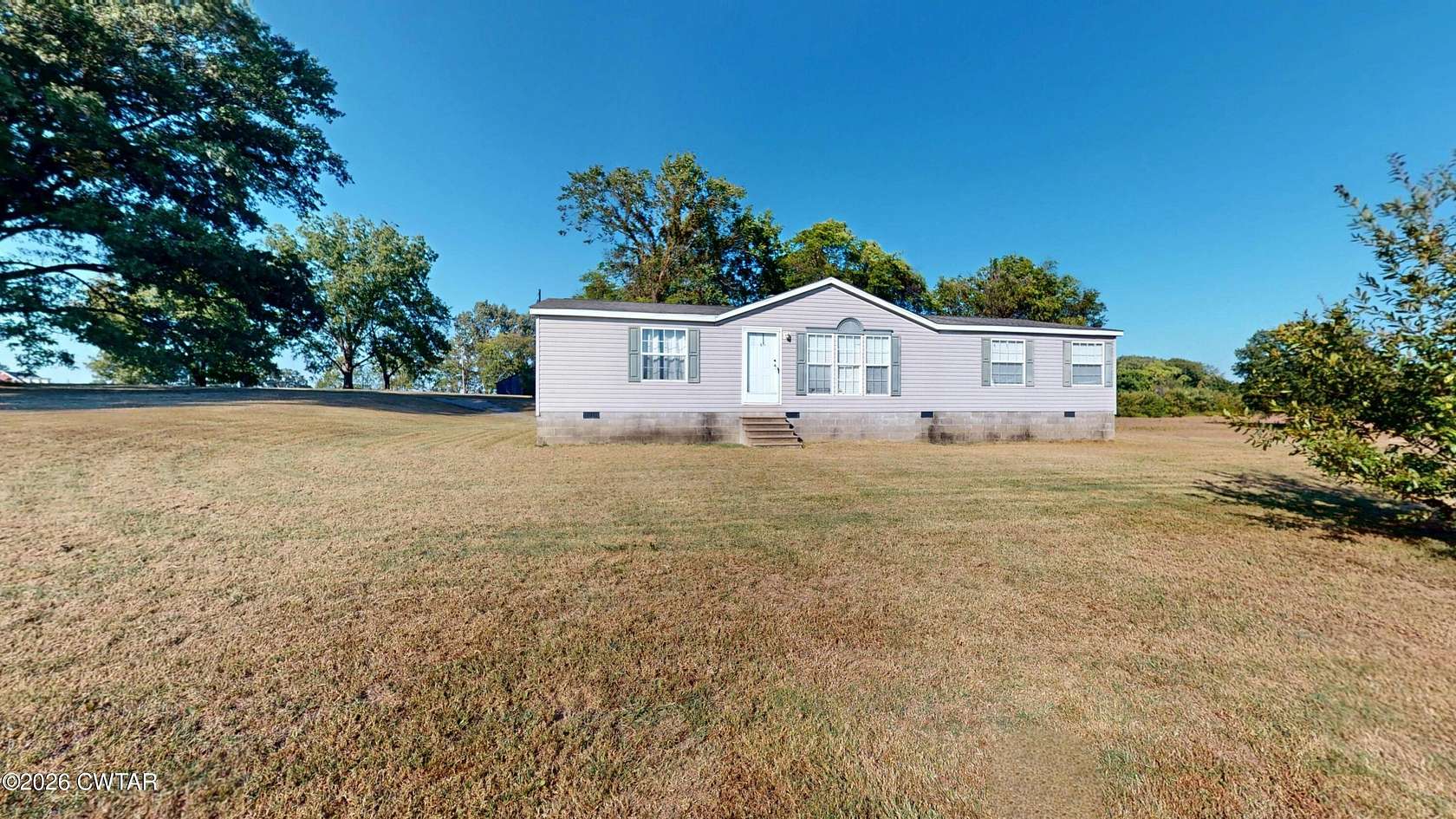 4.89 Acres of Land with Home for Sale in Dyersburg, Tennessee