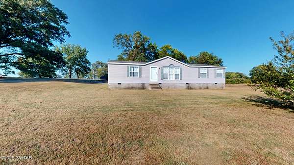 4.89 Acres of Land with Home for Sale in Dyersburg, Tennessee