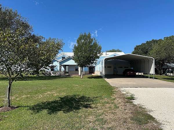73.9 Acres of Land with Home for Sale in Hallettsville, Texas