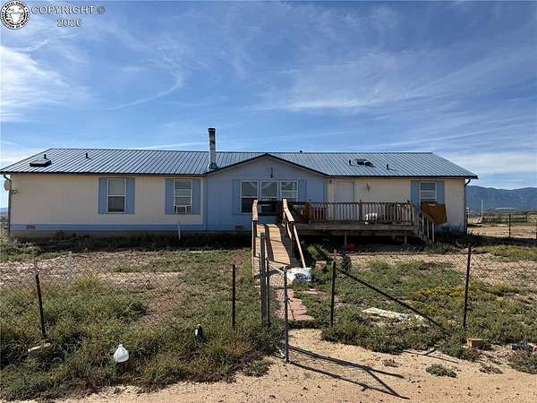 35 Acres of Agricultural Land with Home for Sale in Florence, Colorado