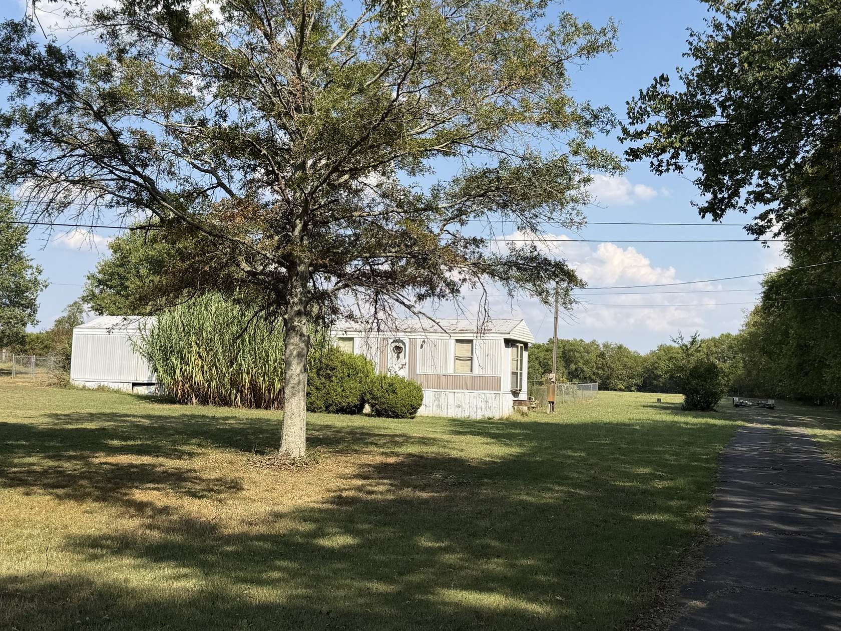 5.19 Acres of Land with Home for Auction in Lewisburg, Tennessee
