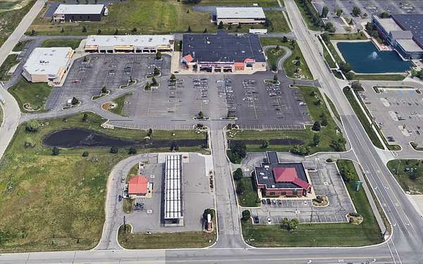 12.4 Acres of Improved Commercial Land for Sale in Zeeland, Michigan