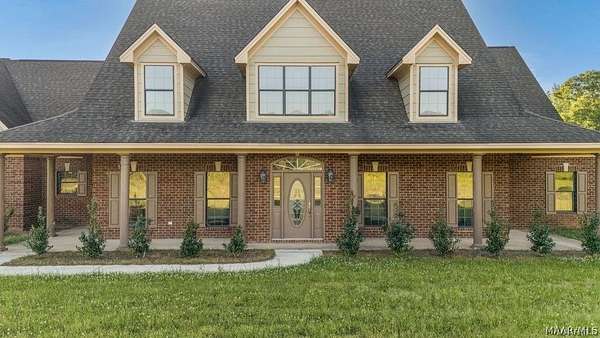 4 Acres of Land with Home for Sale in White Hall, Alabama