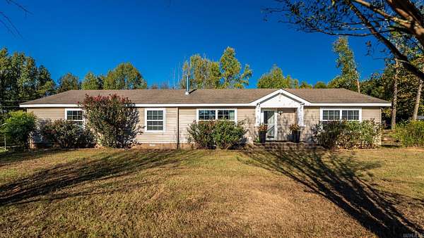 13.9 Acres of Land with Home for Sale in Oppelo, Arkansas