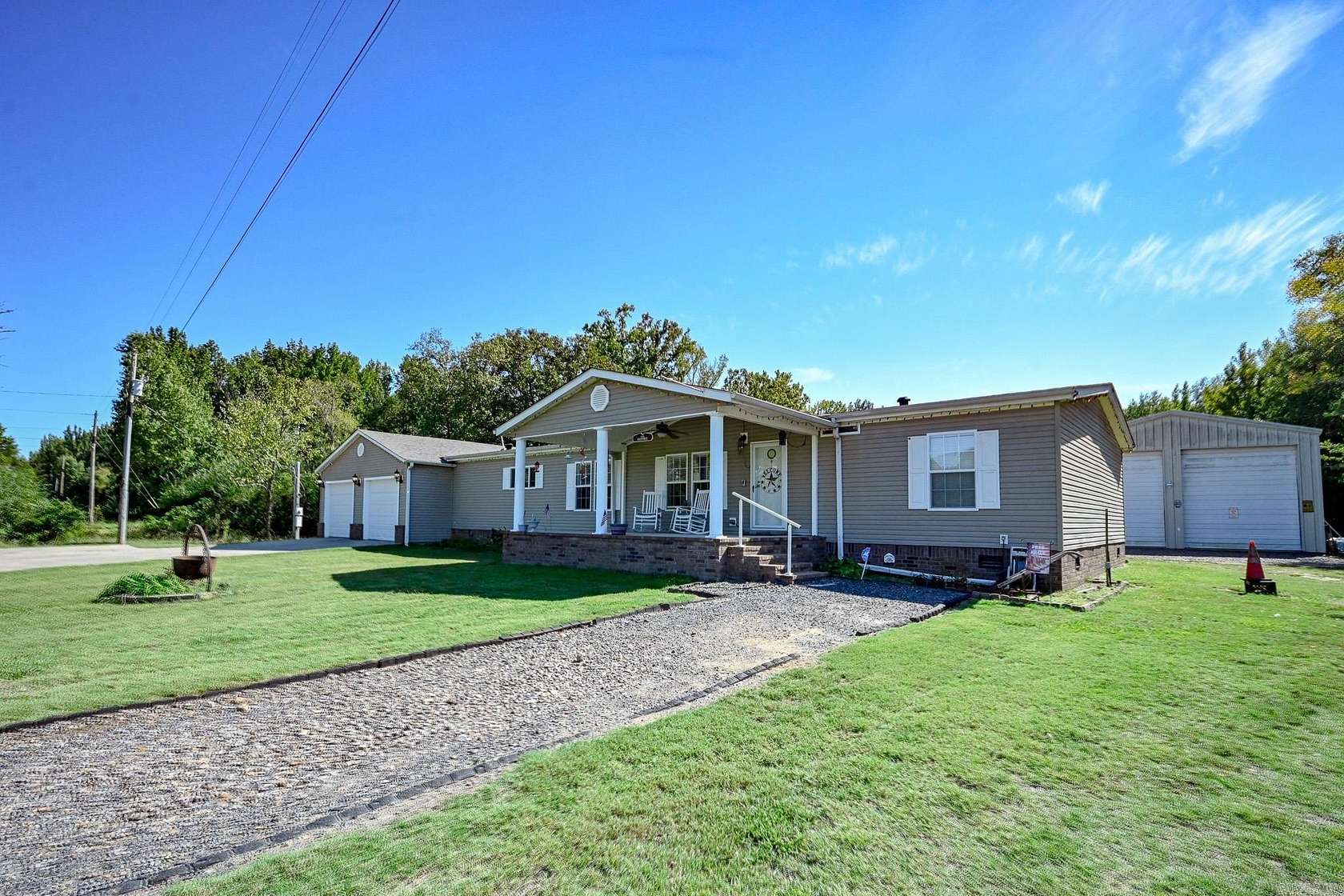 6.36 Acres of Land with Home for Sale in Boles, Arkansas