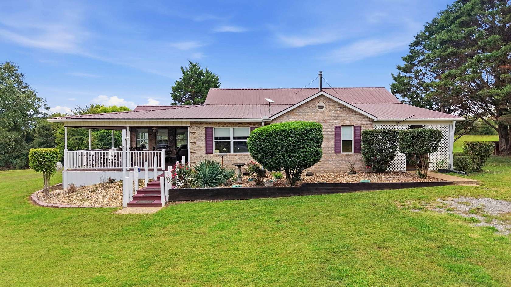 12.8 Acres of Land with Home for Sale in Delano, Tennessee