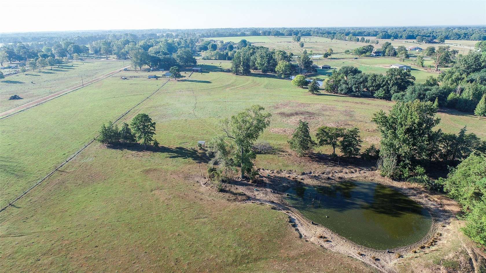 77 Acres of Land with Home for Sale in Pittsburg, Texas