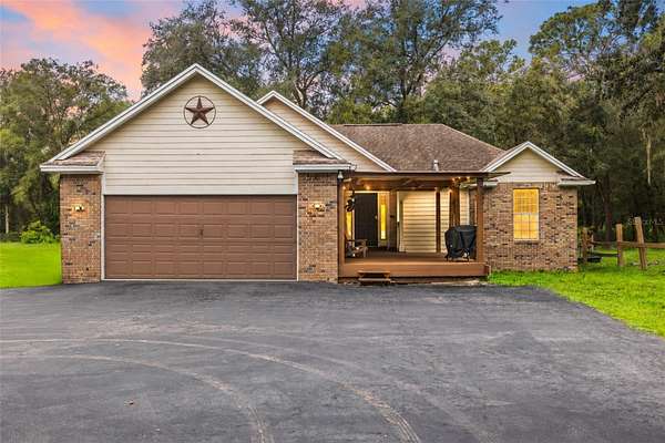 4.66 Acres of Land with Home for Sale in Spring Hill, Florida