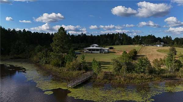 31 Acres of Recreational Land with Home for Sale in Tibbie, Alabama