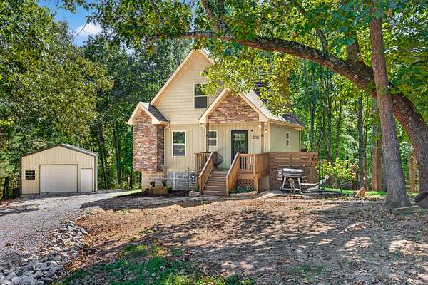 6.77 Acres of Land with Home for Sale in Palmyra, Tennessee