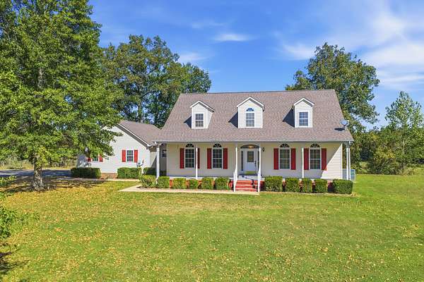 47.3 Acres of Recreational Land with Home for Sale in Huron, Tennessee