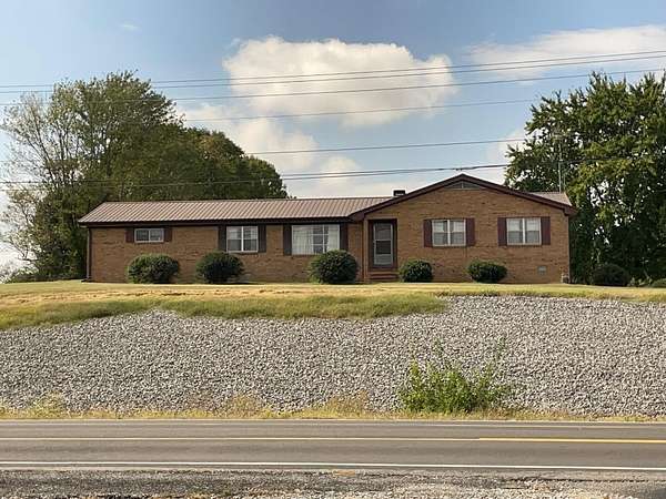 6 Acres of Land with Home for Auction in Mayfield, Kentucky