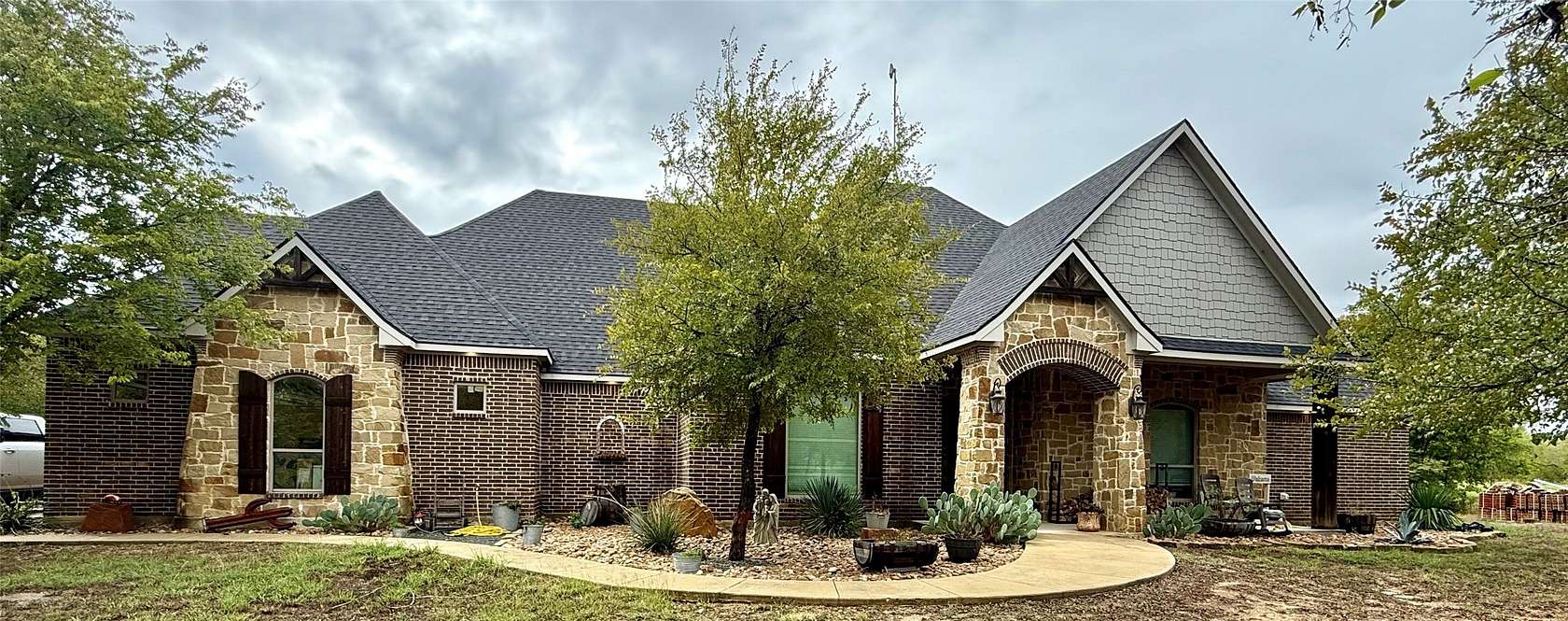 10 Acres of Land with Home for Sale in Ennis, Texas