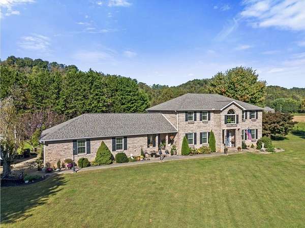 2 Acres of Land with Home for Sale in Crown City, Ohio