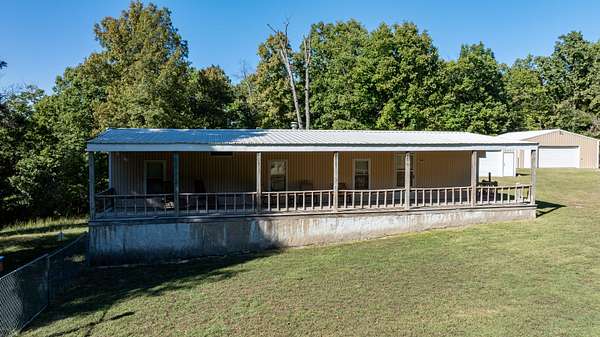 98 Acres of Recreational Land with Home for Sale in Hardy, Arkansas