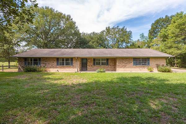9.16 Acres of Land with Home for Sale in Lufkin, Texas