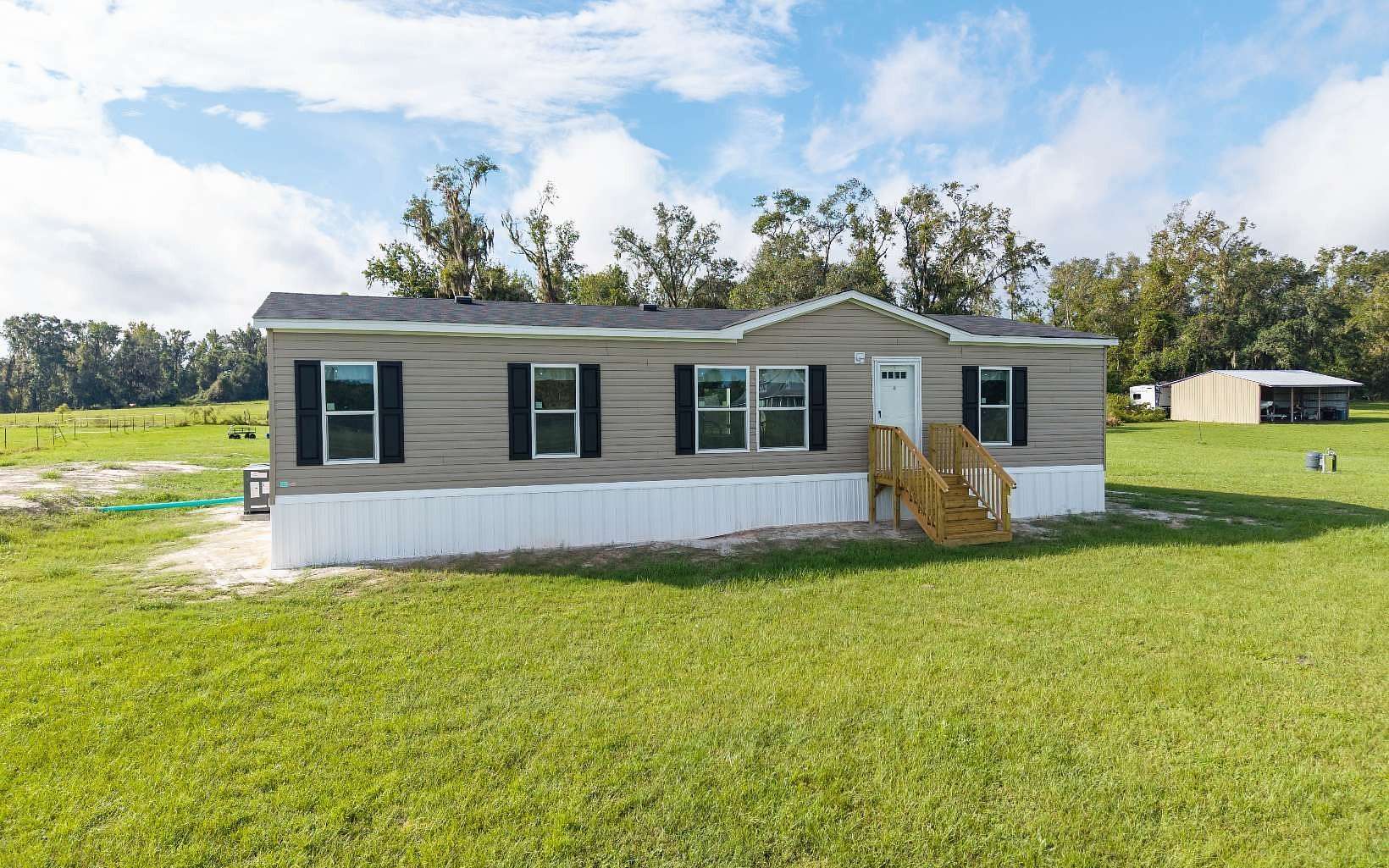 8 Acres of Land with Home for Sale in Live Oak, Florida