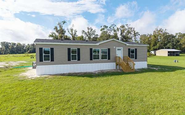 8 Acres of Land with Home for Sale in Live Oak, Florida