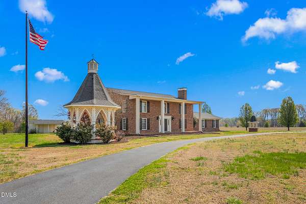 7.26 Acres of Land with Home for Sale in Cedar Grove, North Carolina