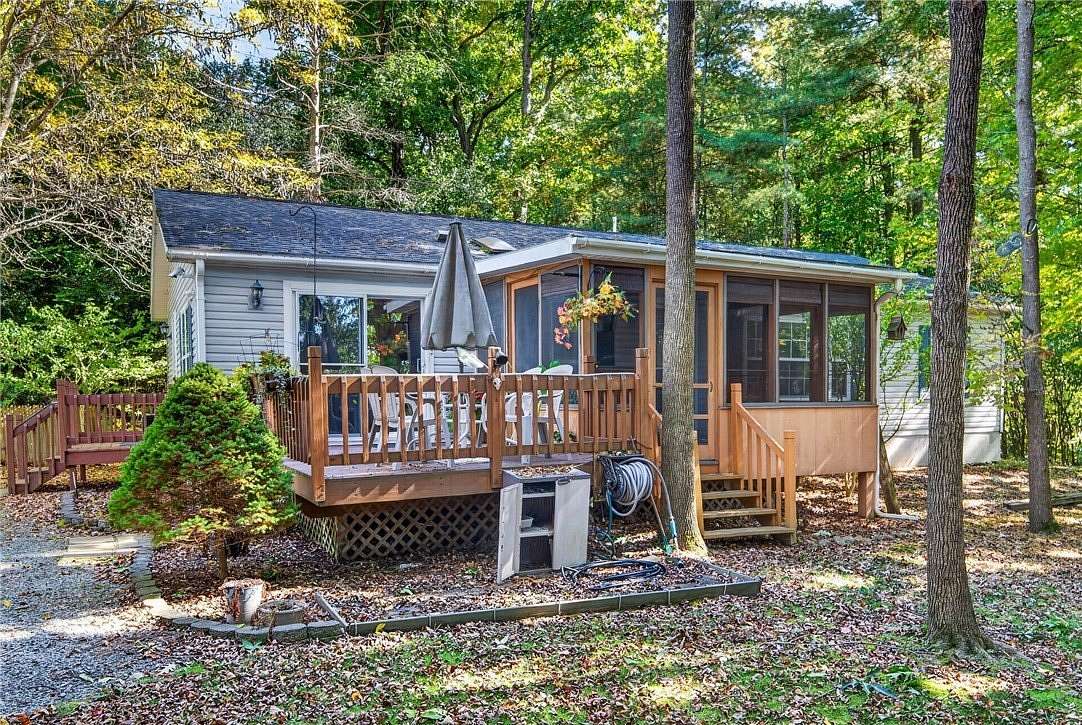 12.5 Acres of Land with Home for Sale in Lansing, New York
