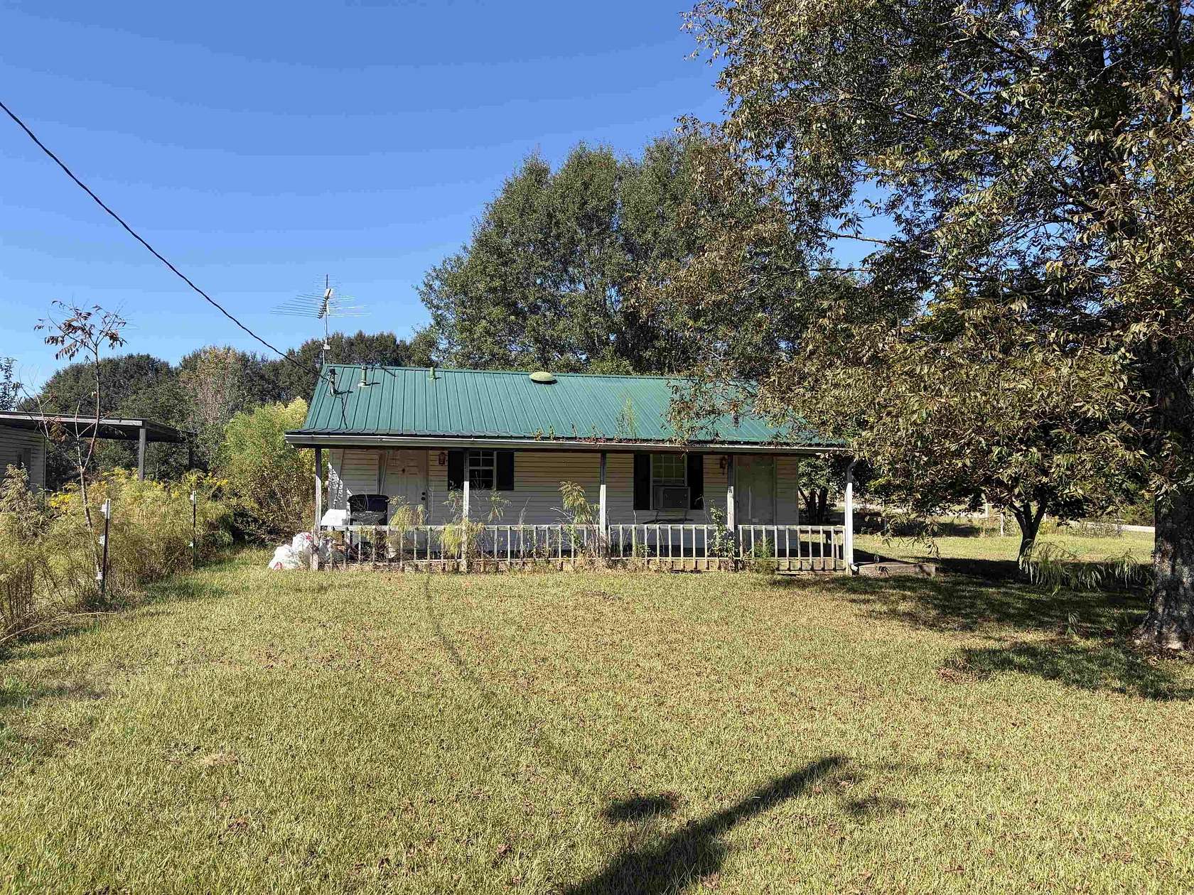 6.7 Acres of Land with Home for Sale in Phil Campbell, Alabama