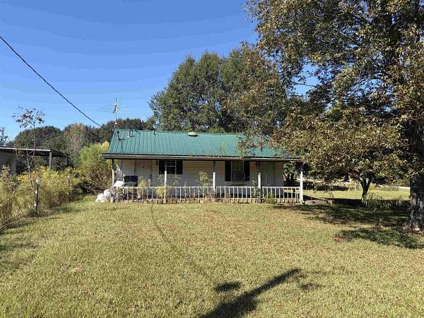 6.7 Acres of Land with Home for Sale in Phil Campbell, Alabama