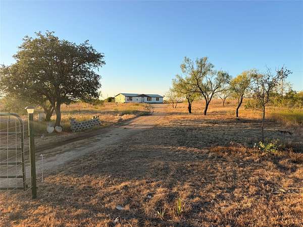 10.4 Acres of Land with Home for Sale in De Leon, Texas