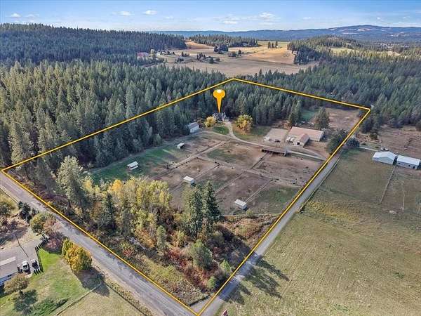 19.5 Acres of Land with Home for Sale in Colbert, Washington