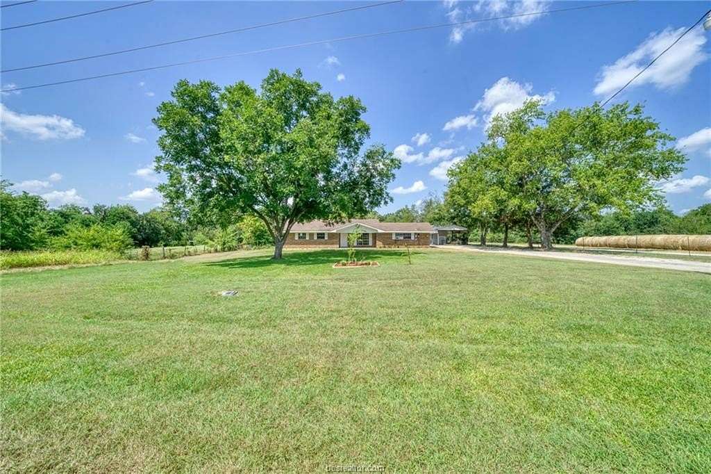 2 Acres of Land with Home for Sale in Madisonville, Texas