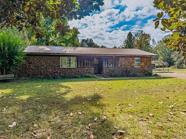 5.2 Acres of Land with Home for Sale in Batesville, Mississippi