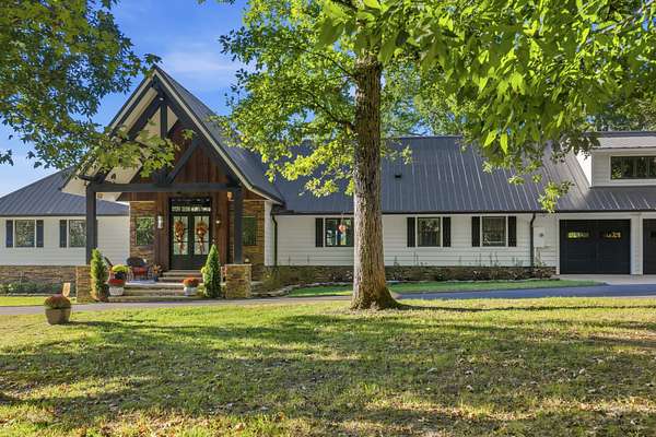 39 Acres of Recreational Land with Home for Sale in Parsons, Tennessee