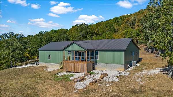 37.4 Acres of Recreational Land with Home for Sale in Alpena, Arkansas