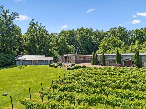 16.4 Acres of Land with Home for Sale in Hampshire, Tennessee