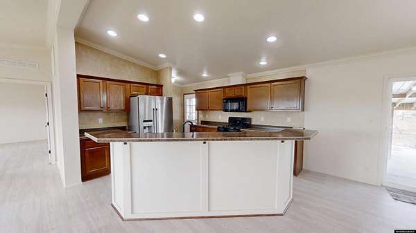 6 Acres of Land with Home for Sale in Evansville, Wyoming