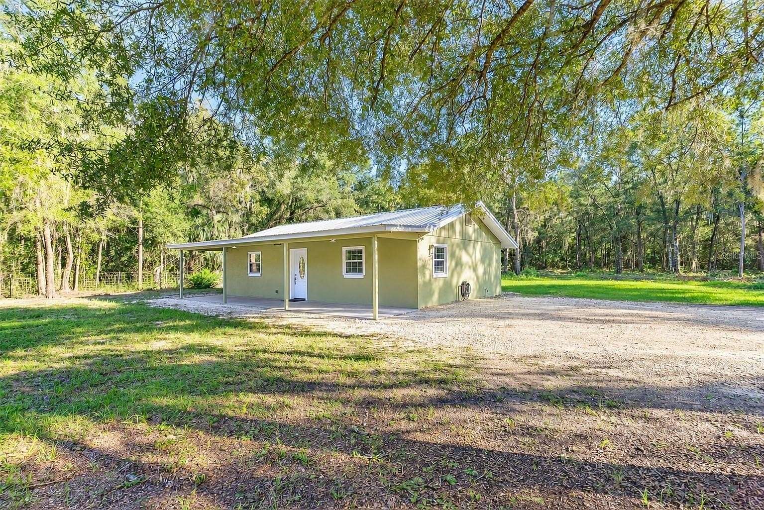 2.36 Acres of Land with Home for Sale in Inglis, Florida