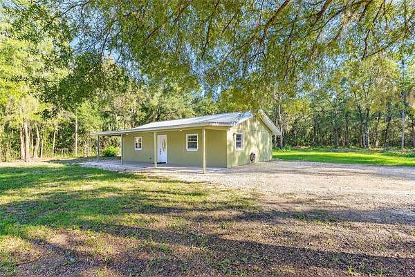 2.36 Acres of Land with Home for Sale in Inglis, Florida