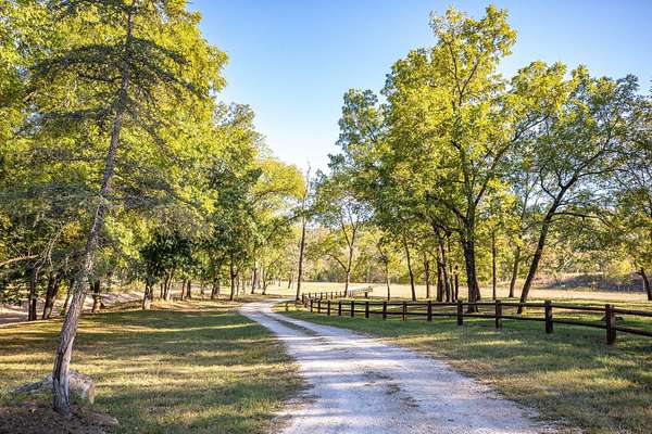 1,112 Acres of Recreational Land with Home for Sale in Walnut Shade, Missouri