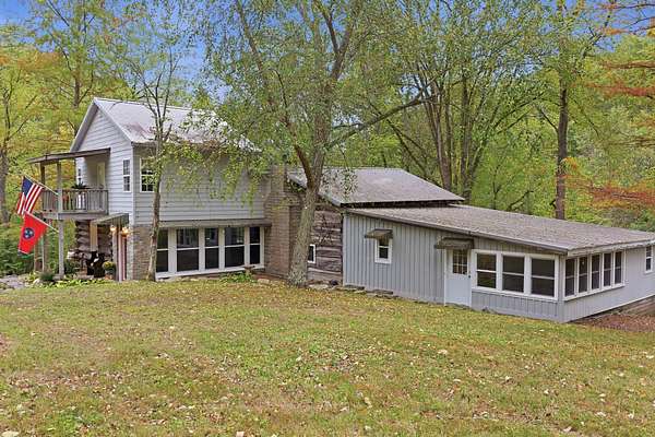 21.2 Acres of Land with Home for Auction in Woodbury, Tennessee