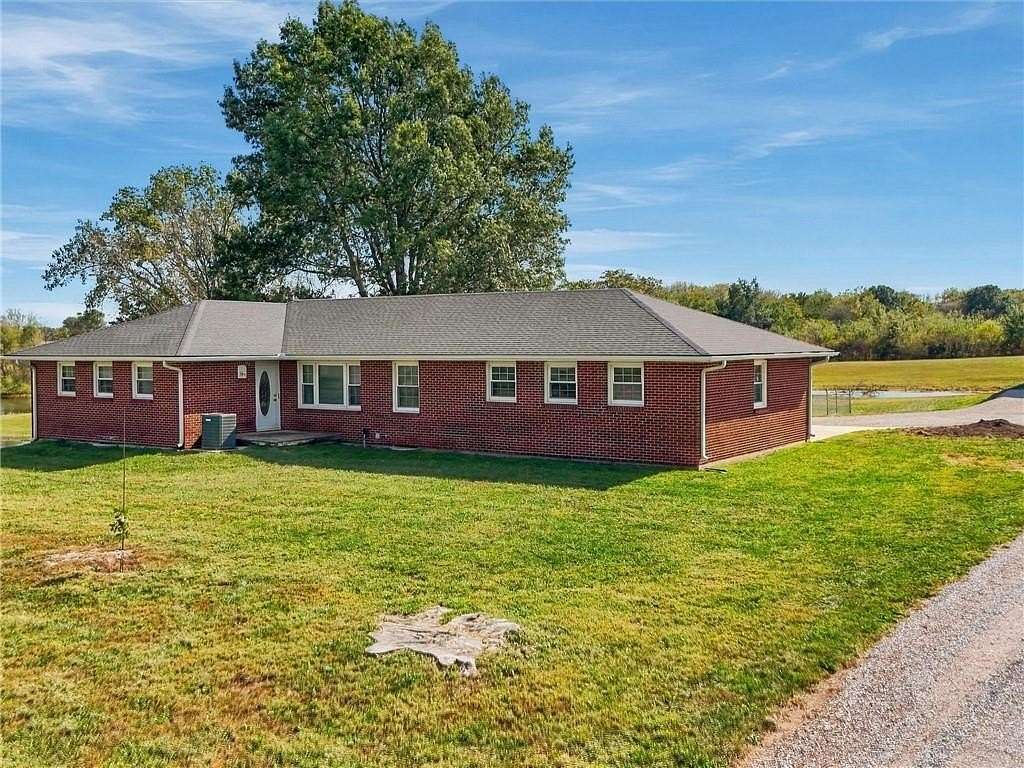 7.33 Acres of Land with Home for Sale in Odessa, Missouri